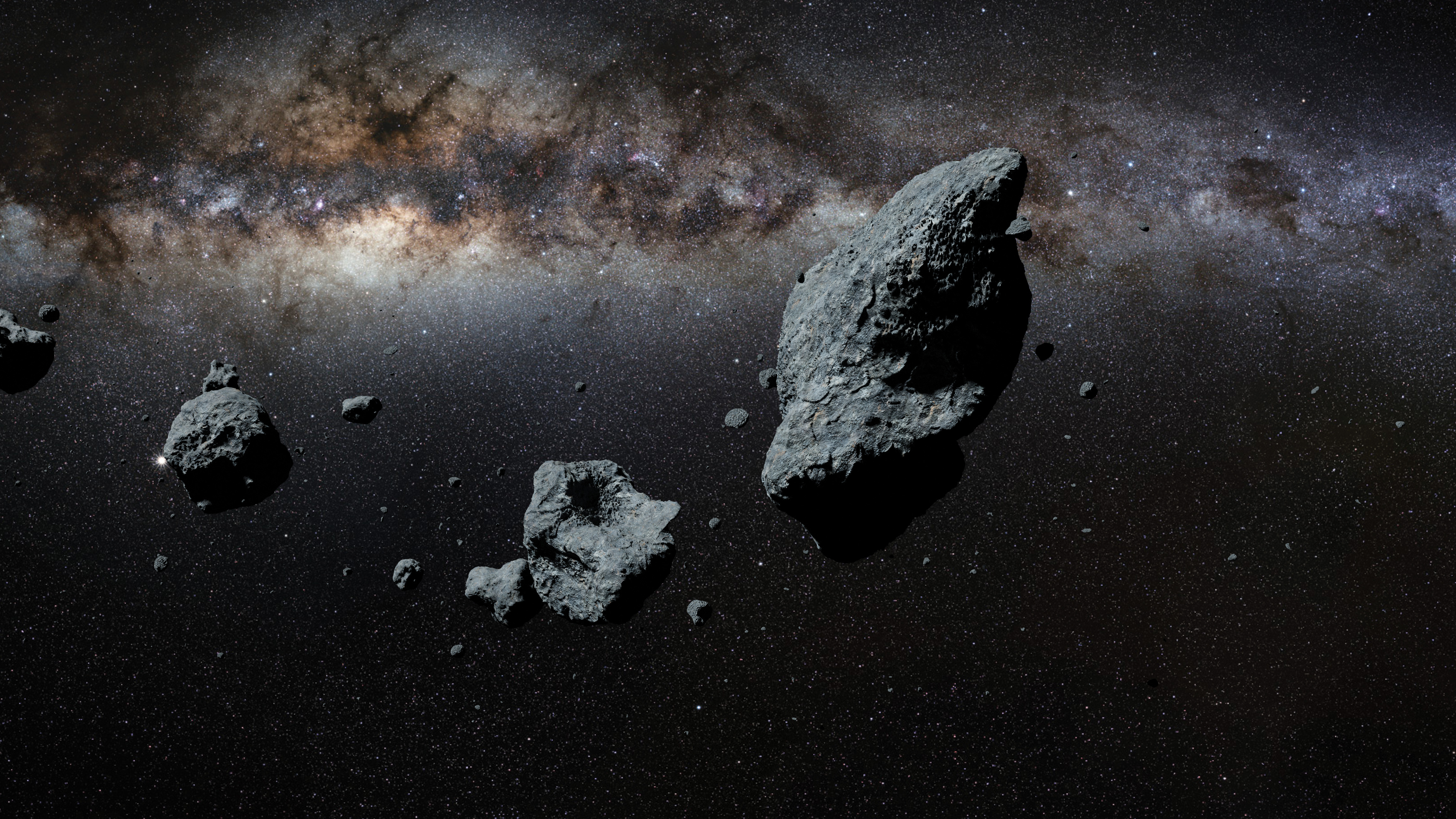 Название группы астероидов. Астероид Тютчев 9927. Осколки астероида. Обломки астероидов. Космические астероиды.