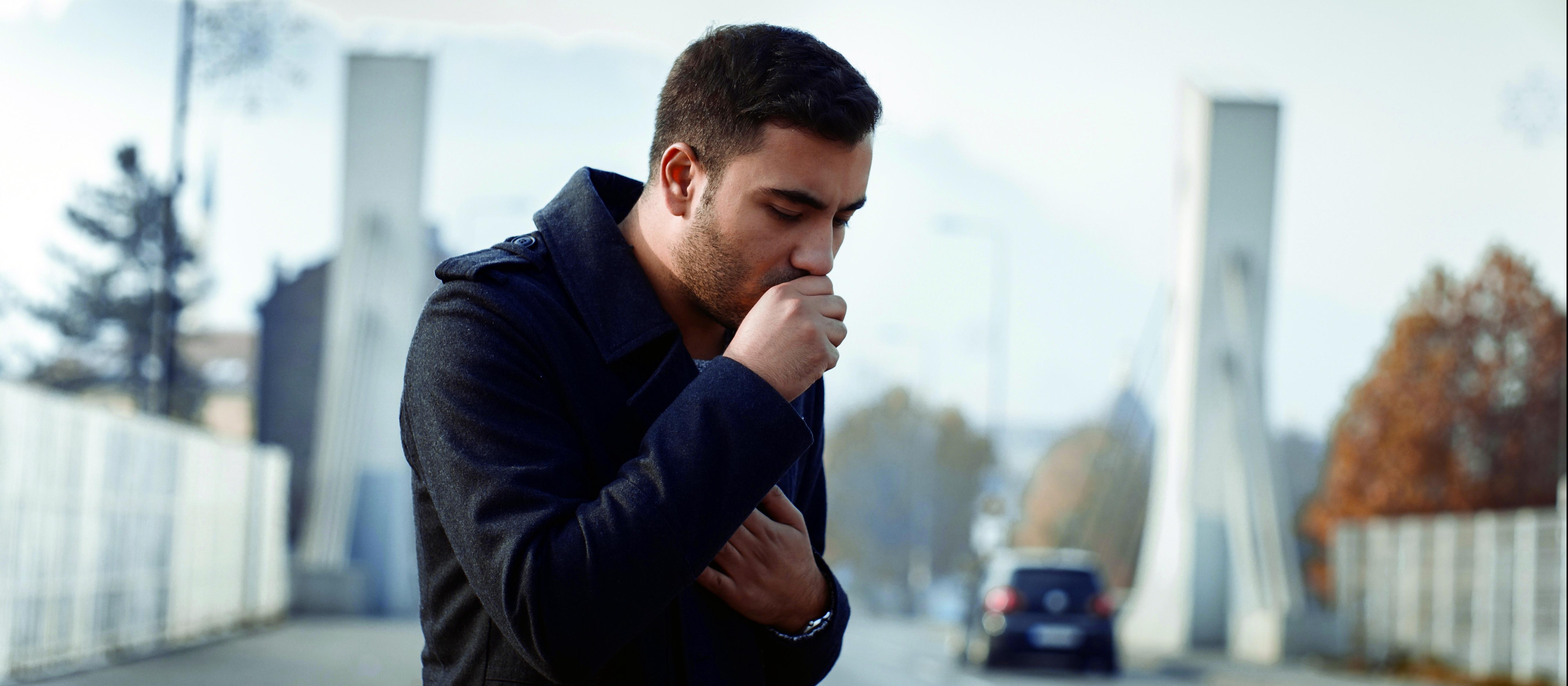 man coughing - generic 