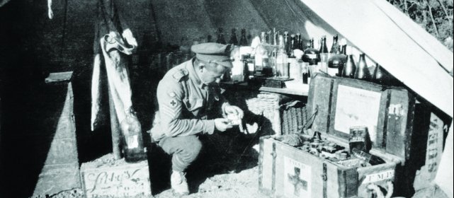Australian soldier checks supplies