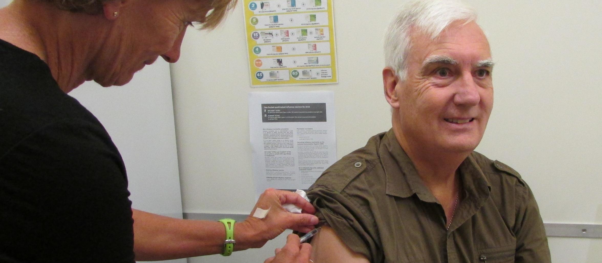 flu vaccine 2019, Kevin Saunders gets his annual influenza immunisation from nurse Kristine Reid [photo: supplied]
