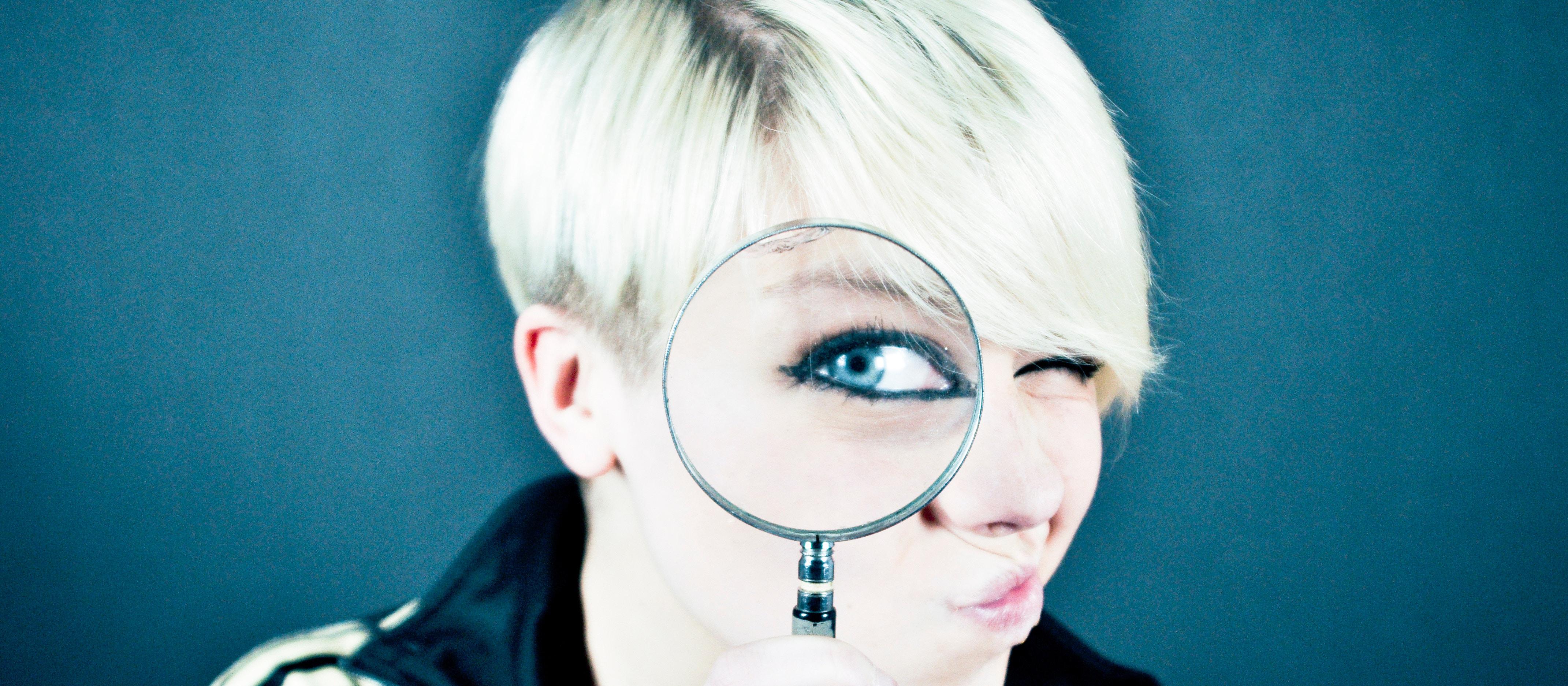 woman with magnifying glass