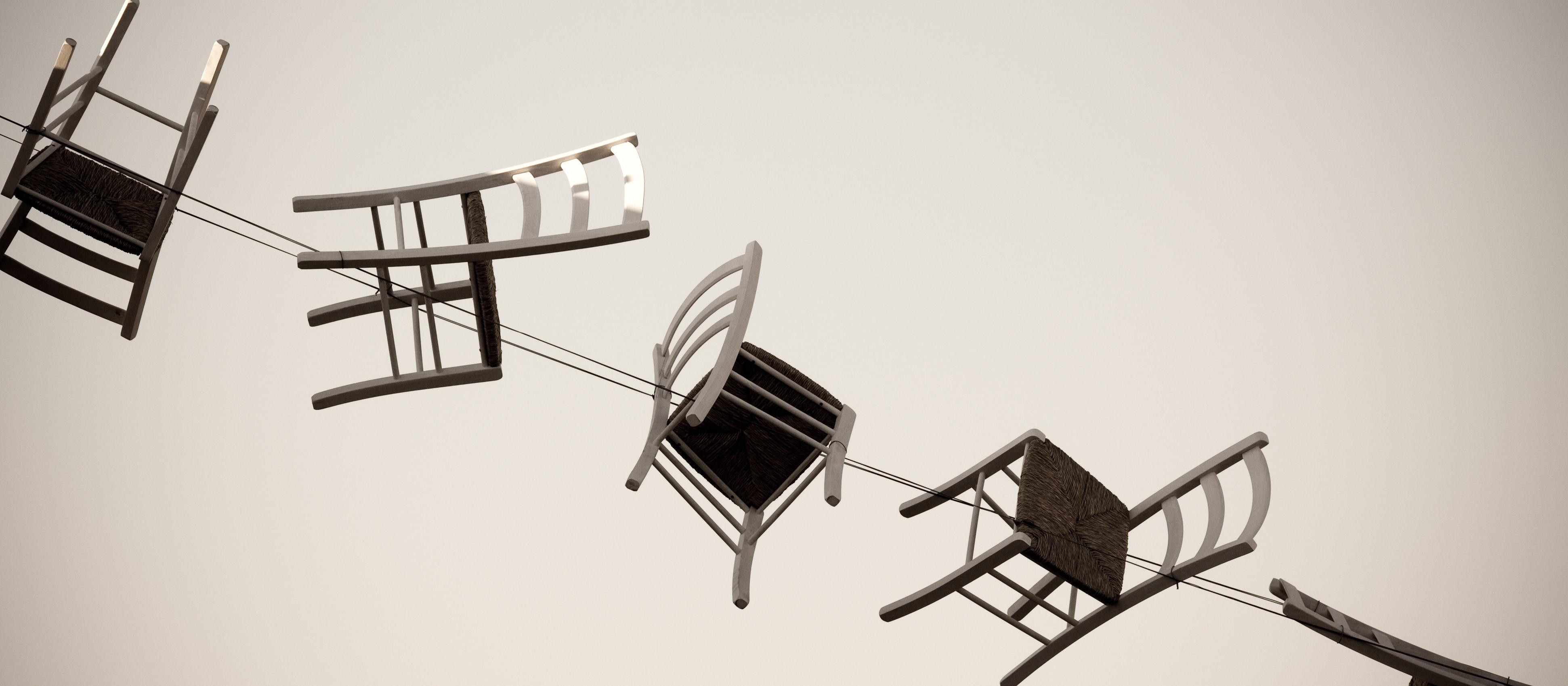 Chairs_in_the_air_Photo by Federica Campanaro on Unsplash