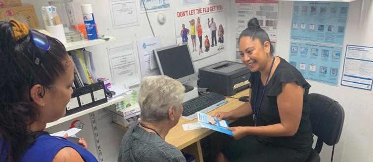 Pharmacist Mariana Hudson with patients 