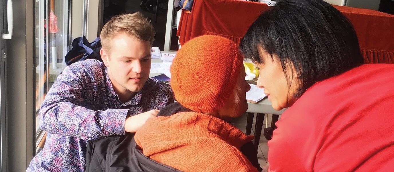 Brendon McIntosh administers a flu jab