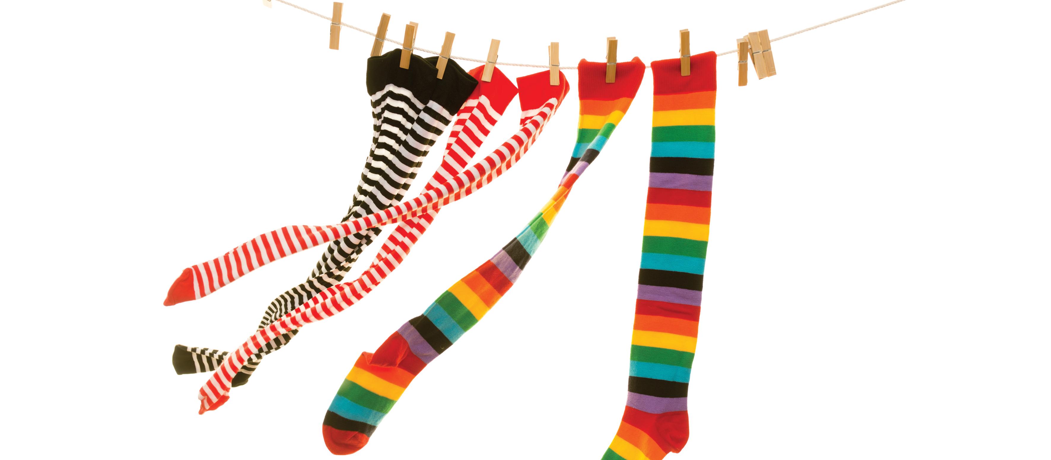 Coloured long socks on washing line