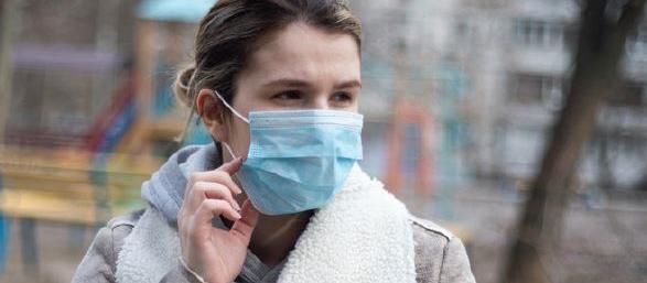 woman wearing a mask