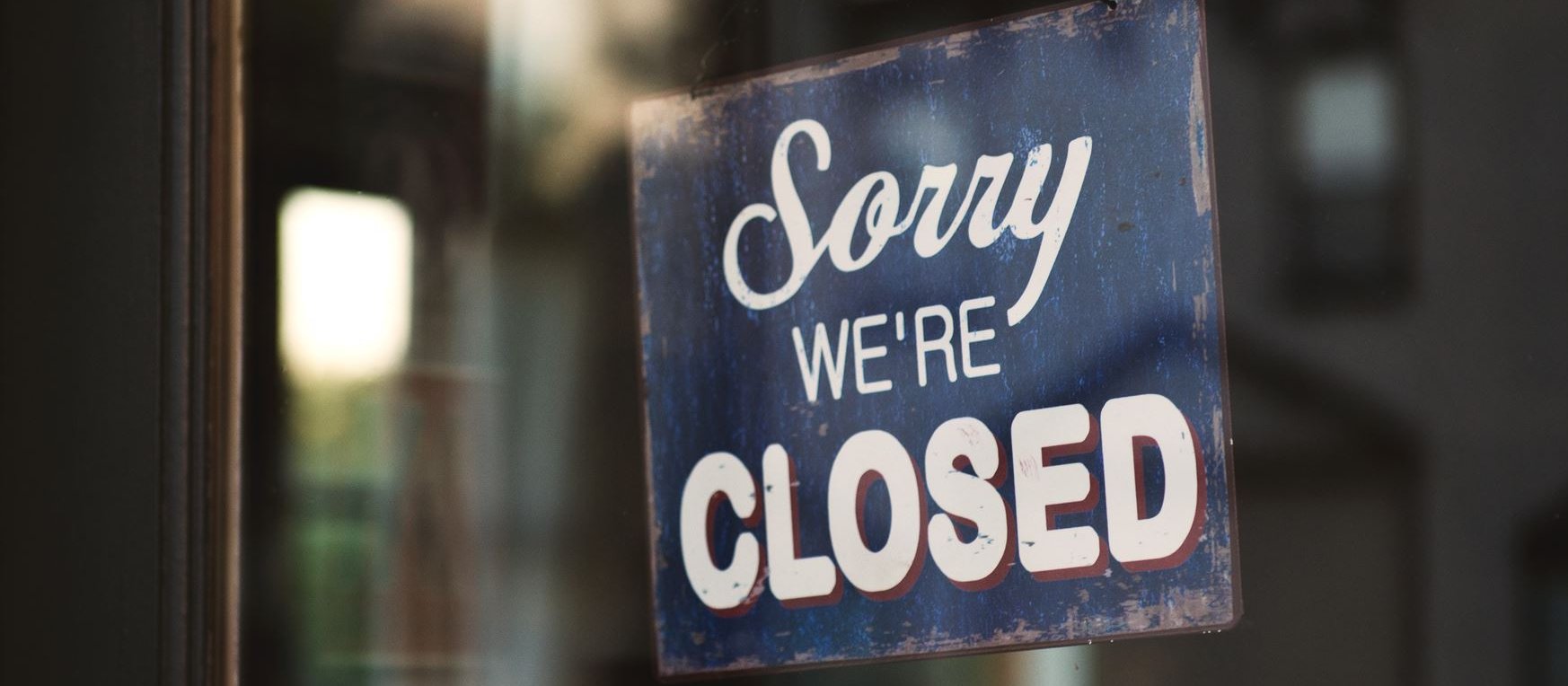 closed sign CR Tim Mossholder on Unsplash