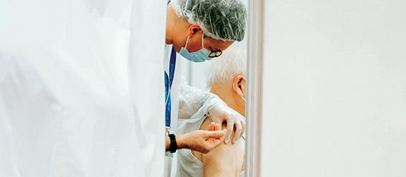Someone getting their vaccination