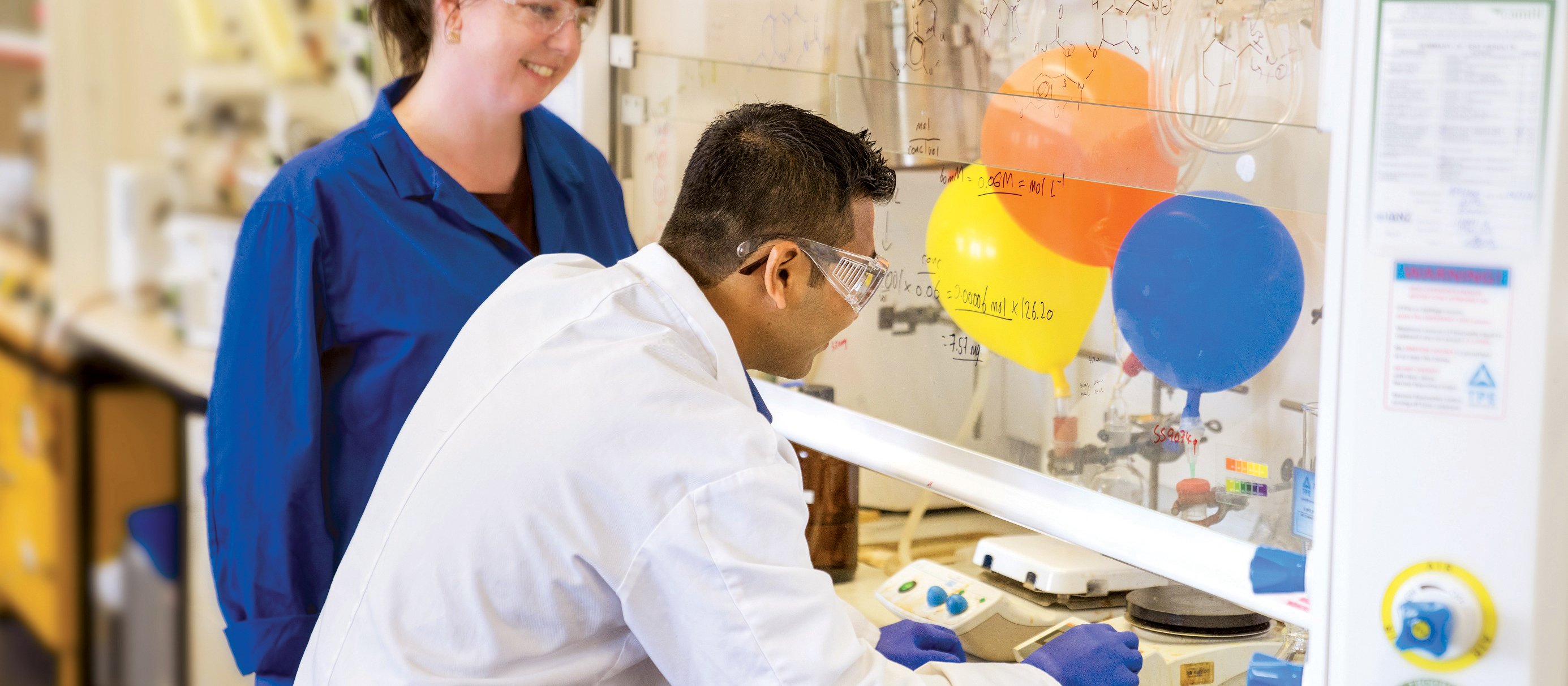 Professor and student in a lab