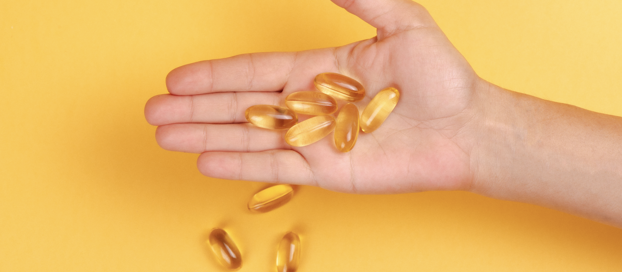 Hand with Omega capsules 