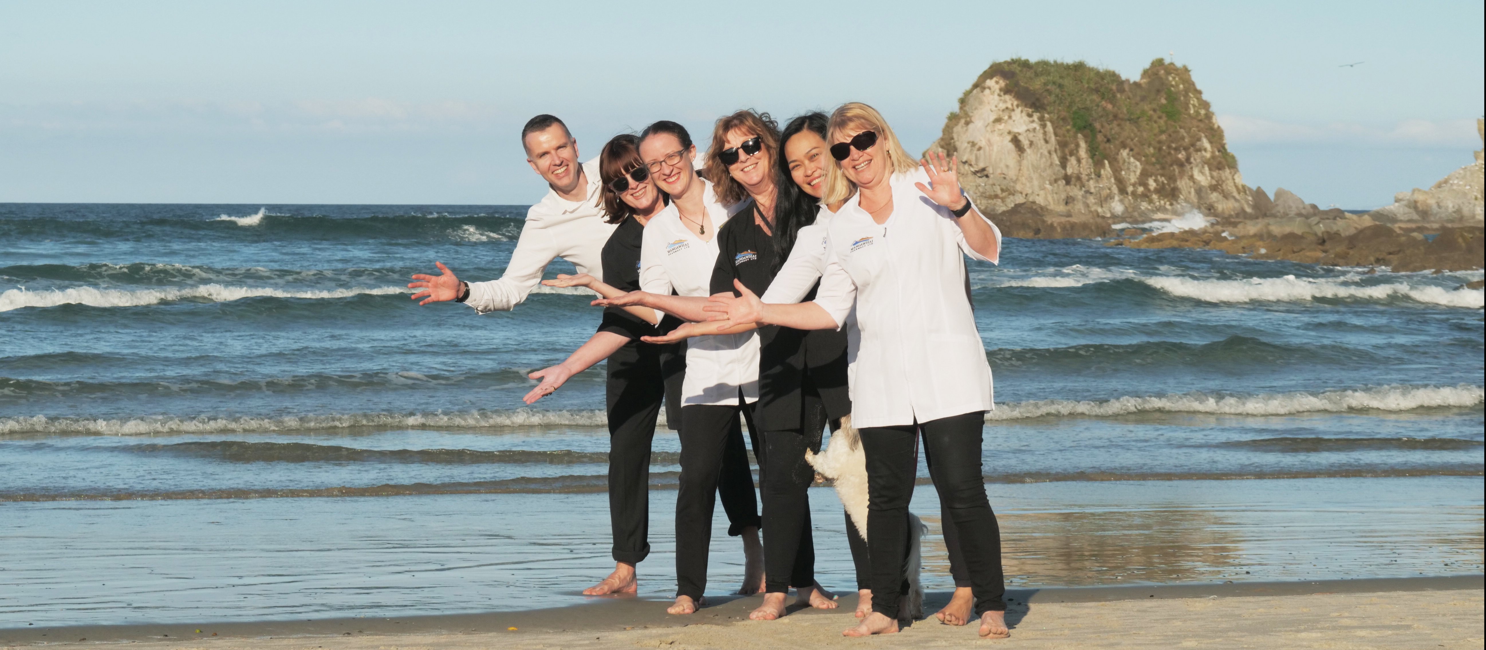 Mangawhai Pharmacy staff members at the beach 