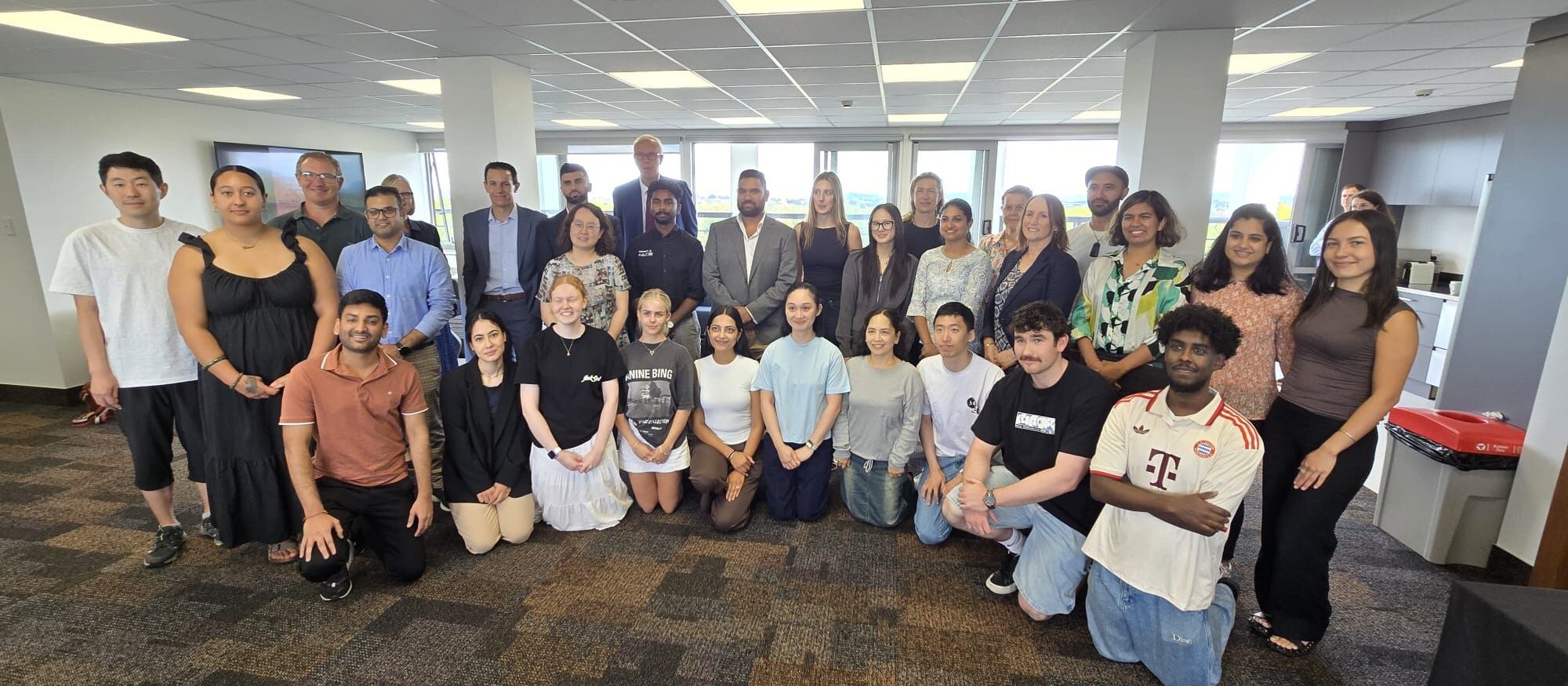 Waikato pharmacy school's inaugural class of 2025 with Uni staff and pharmacy reps (CR Grier Fisher)