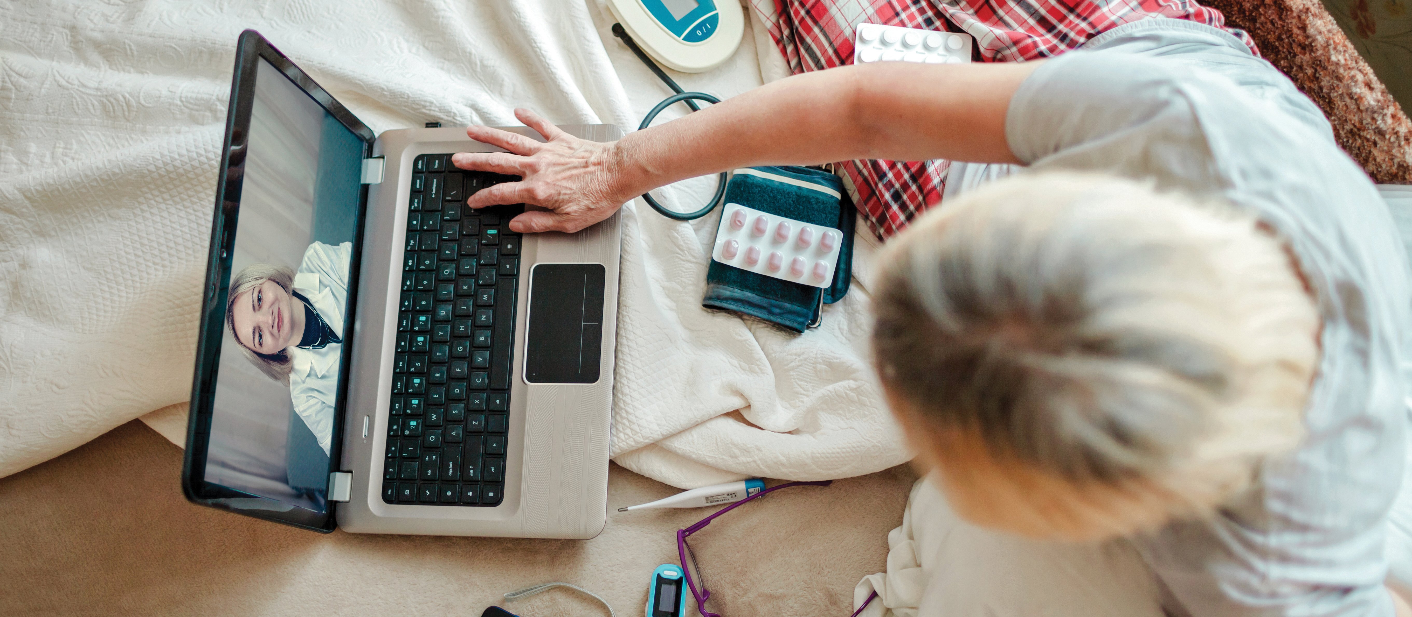 telehealth woman laptop iStock CR Maria Symchych Navrotska 