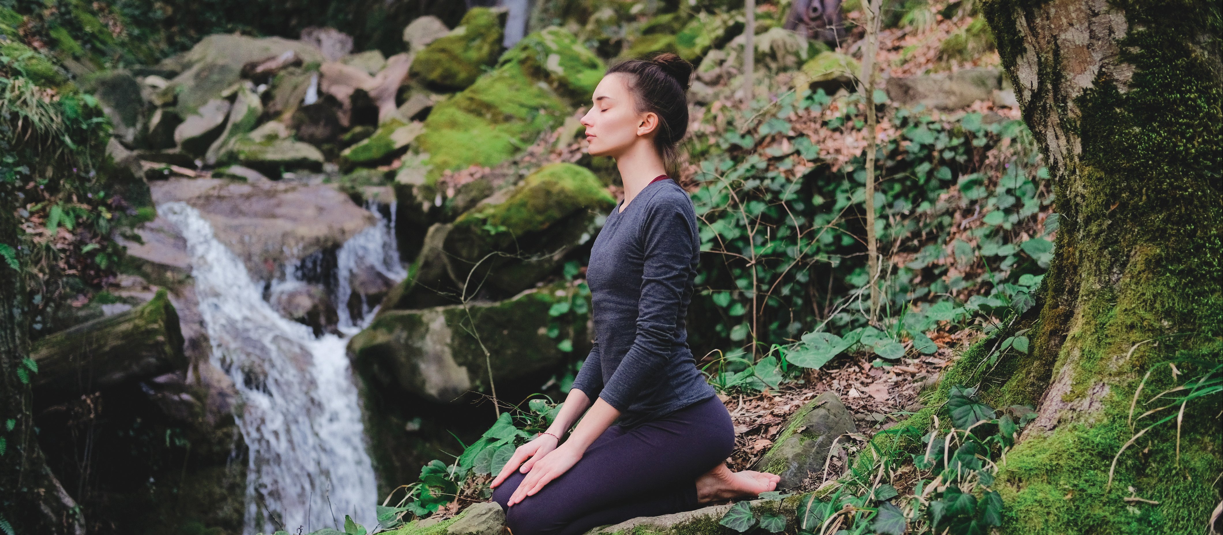 Woman Meditating forest CR Yolya on iStock