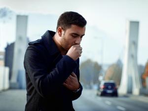 man coughing - generic 