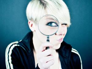 woman with magnifying glass