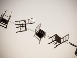 Chairs_in_the_air_Photo by Federica Campanaro on Unsplash