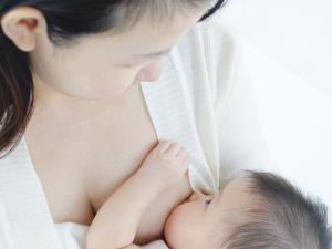 Asian woman breastfeeding
