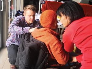 Brendon McIntosh administers a flu jab