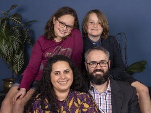 Jo Hikaka at her home in Takapuna with her husband Jay Strydom, and their children Huia and Pete