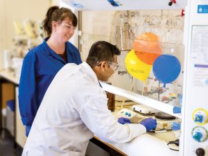 Professor and student in a lab
