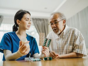 Patient with nurse drug dispensing