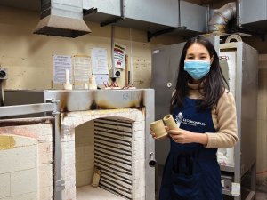 Pharmacist Angela Liu crafting pottery