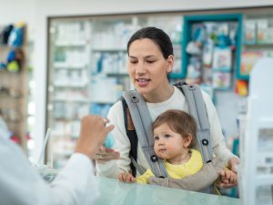 Mother and child at pharmacy