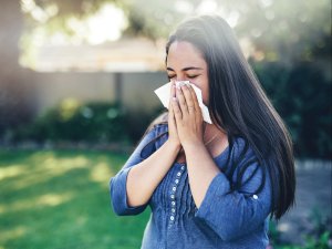 Sick sneeze cold flu woman