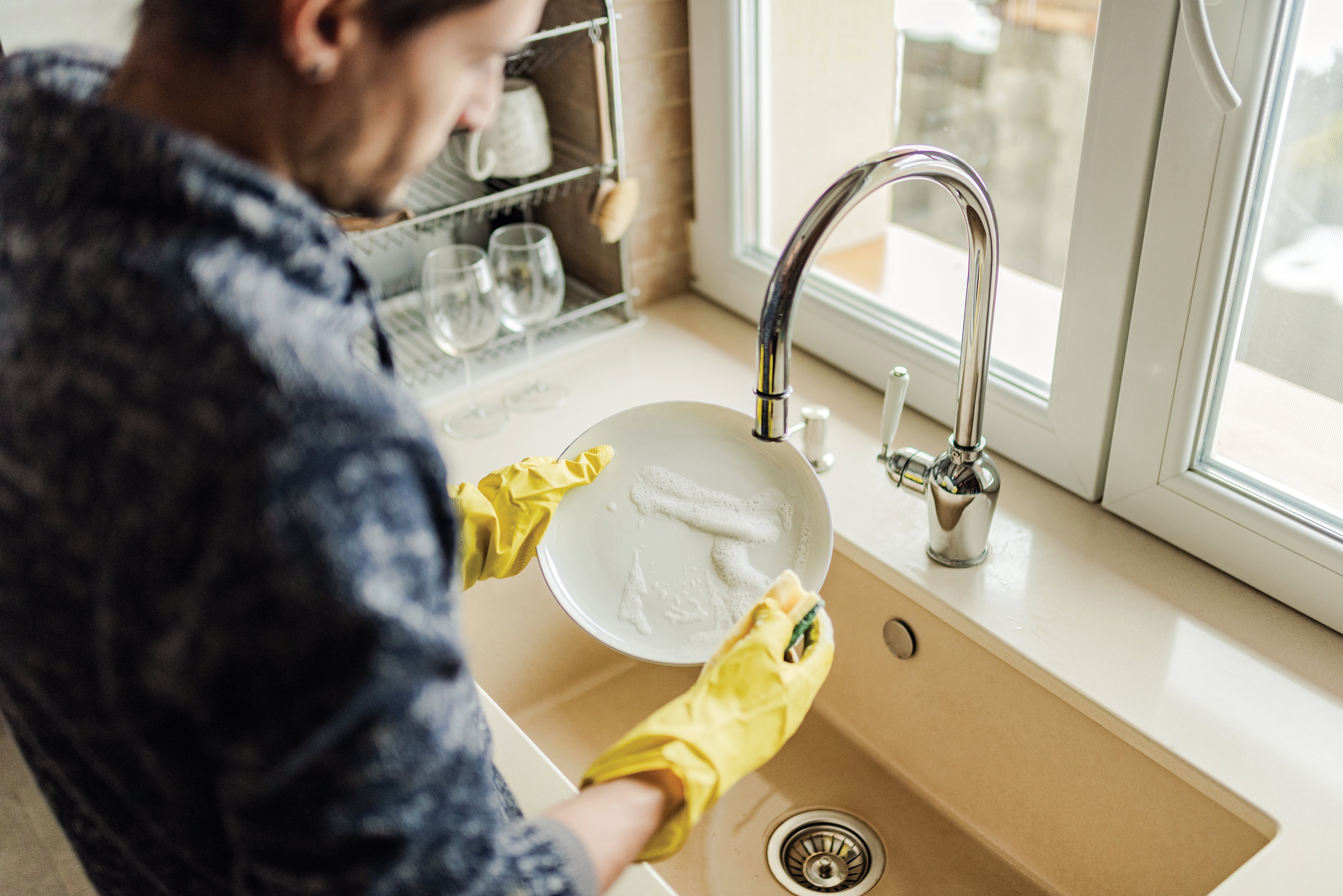 Man washing dishes