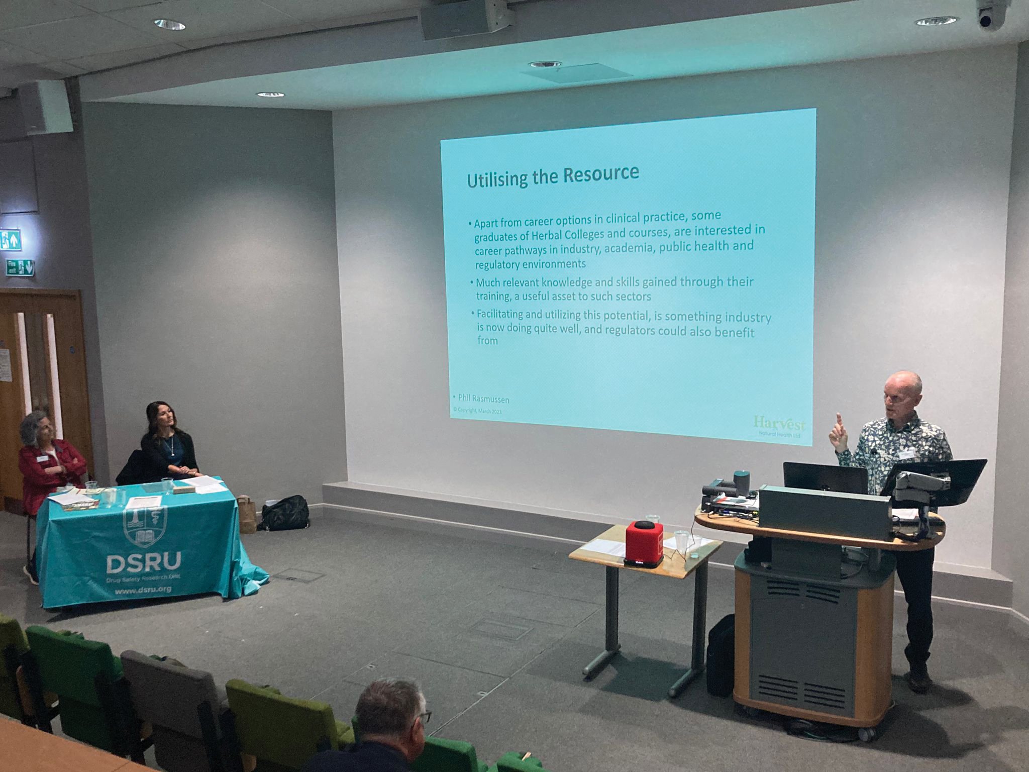 Phil Rasmussen speaking at conference