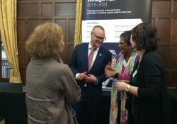 Health minister David Clark speaks to Aarti Patel from the CCPG and others