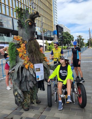 Mr Allan Bullot dressed as a tree with Dr Natalie Gauld