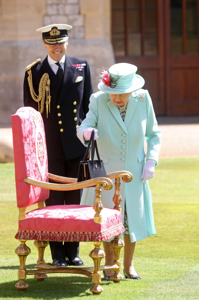 Lasting affection: the Queen preparing to confer a knighthood on Captain Tom Moore in 2020 [Image: Chris Jackson/PA Images/Alamy Stock Photo]
